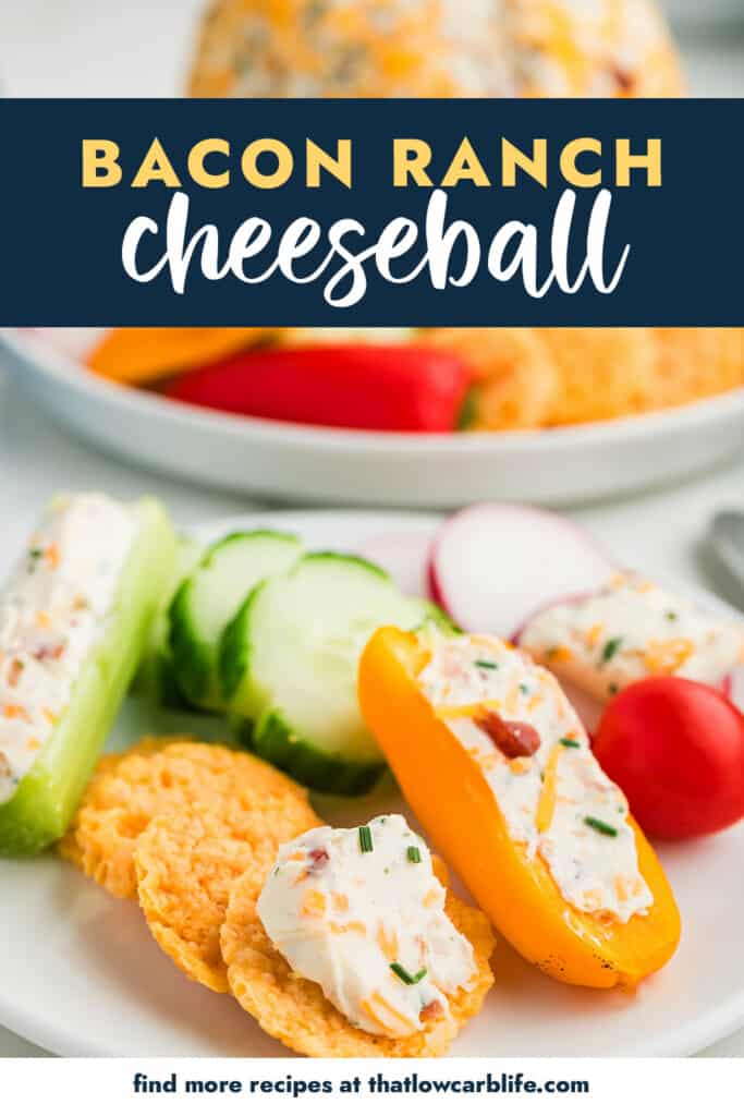 Crackers and vefetables topped with cheese bal mixture.