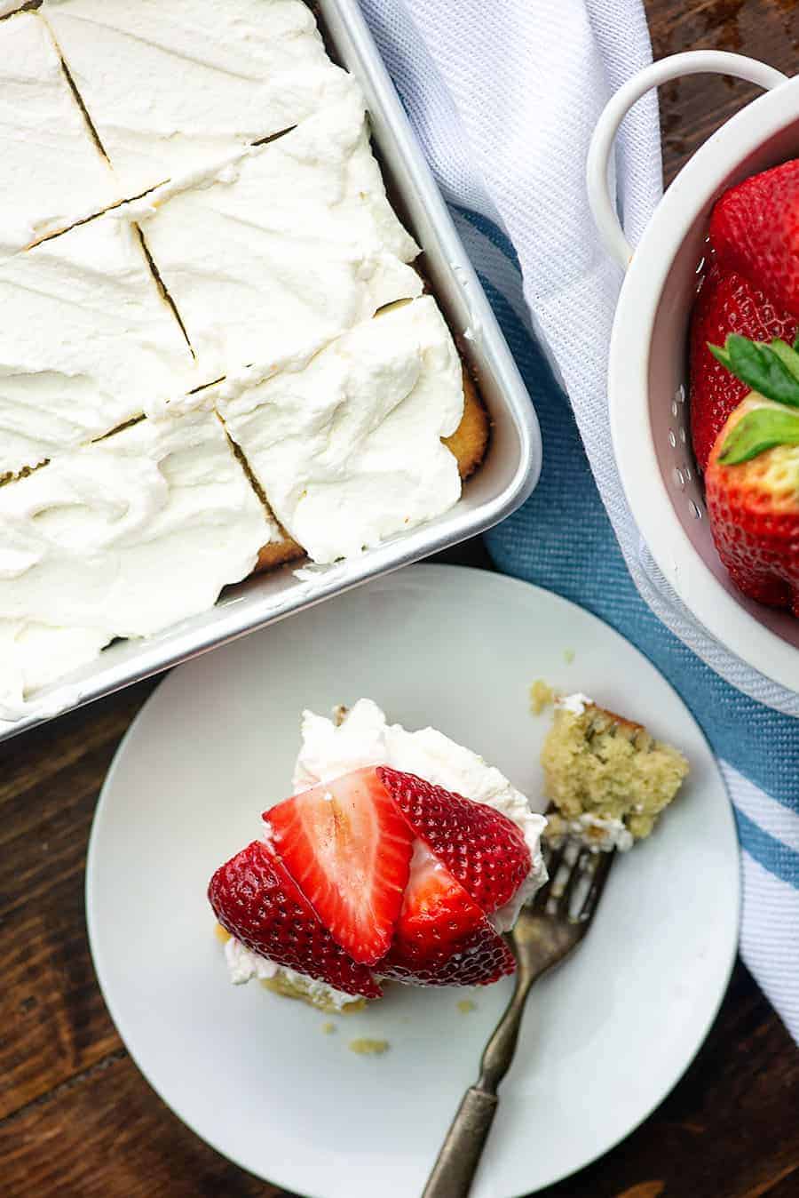 overhead view of strawberries and cream cake