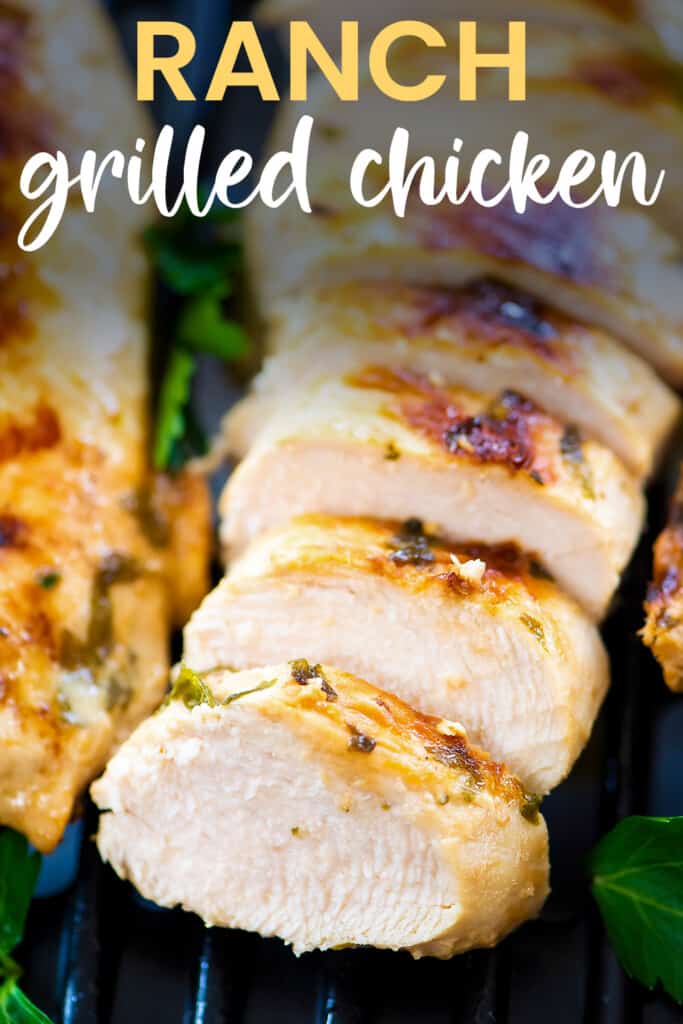 Sliced grilled chicken on grill.