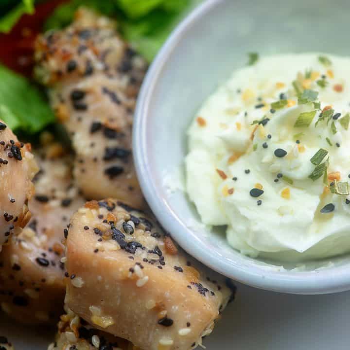 A close up of a plate of food, with Bagel