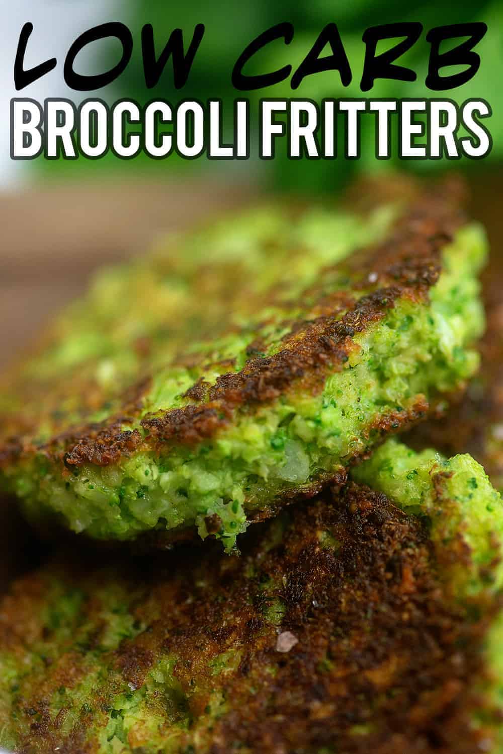 A close up of a broccoli fritter leaning against another fritter.