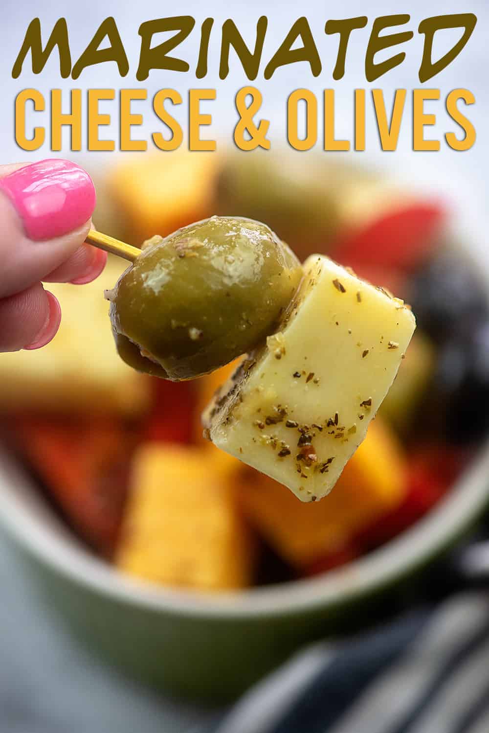 toothpick with olive and cheese