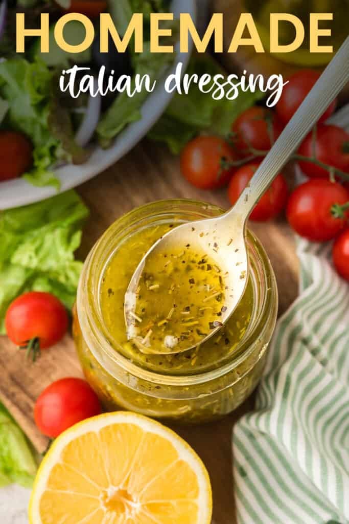 Italian dressing in mason jar with spoon.