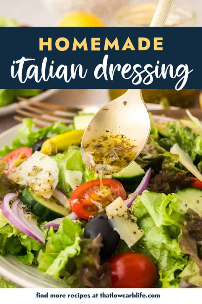 Italian dressing being drizzled over green salad.
