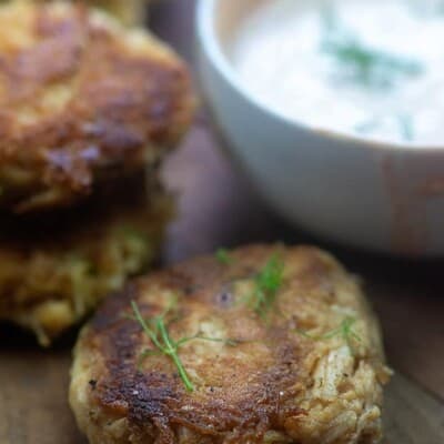 chicken patties on cutting board.