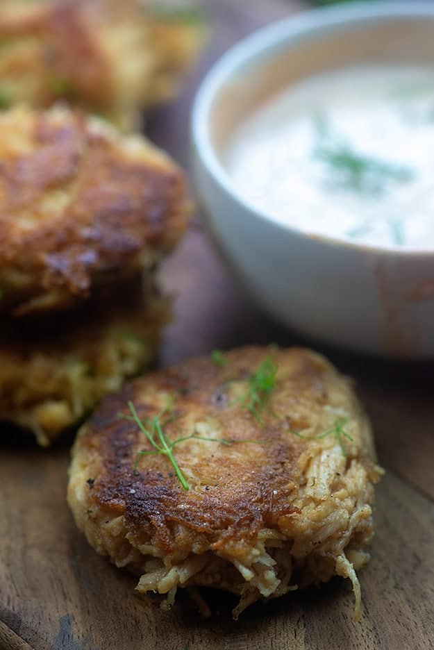 chicken patties on cutting board.