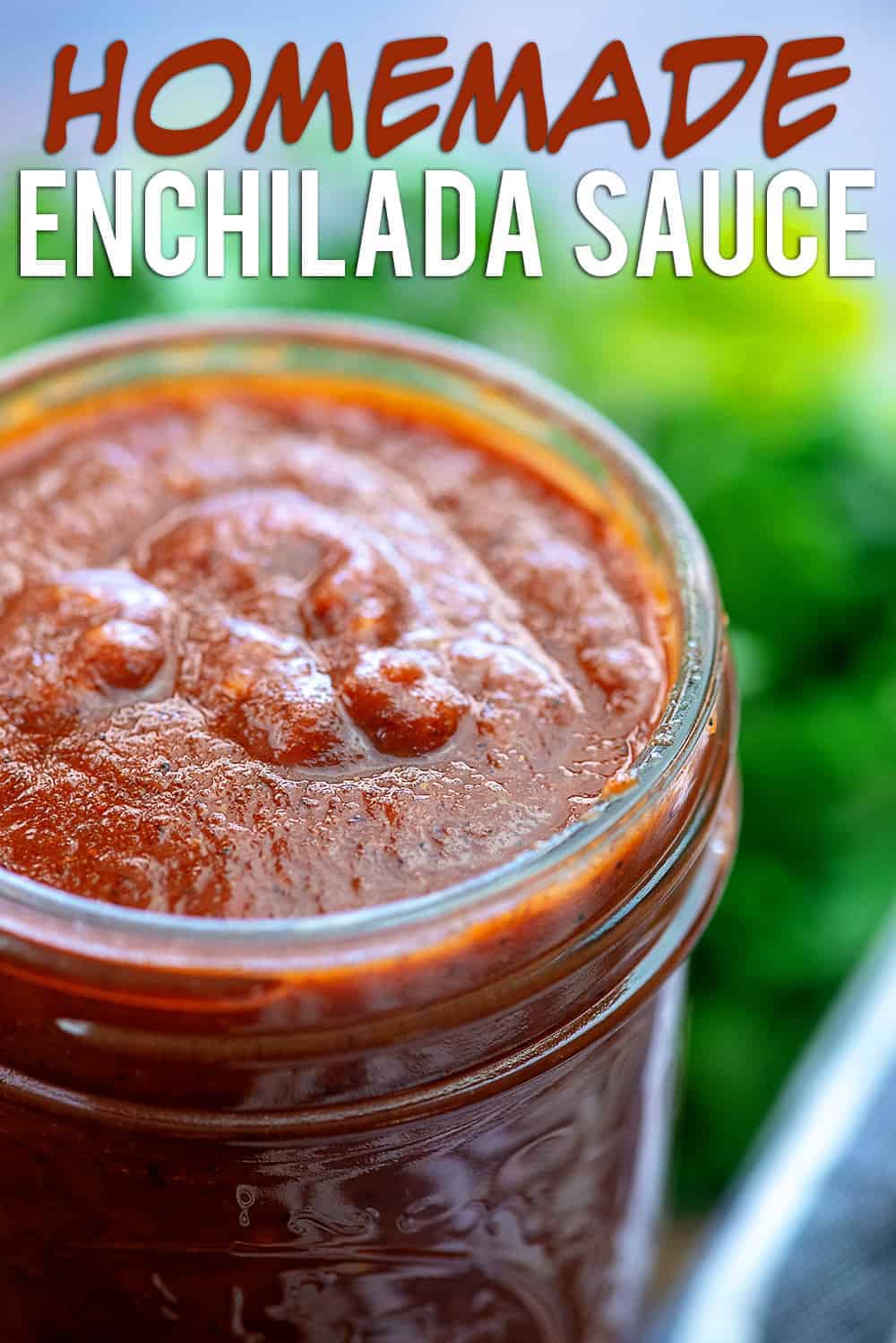 Glass mason jar of red enchilada sauce