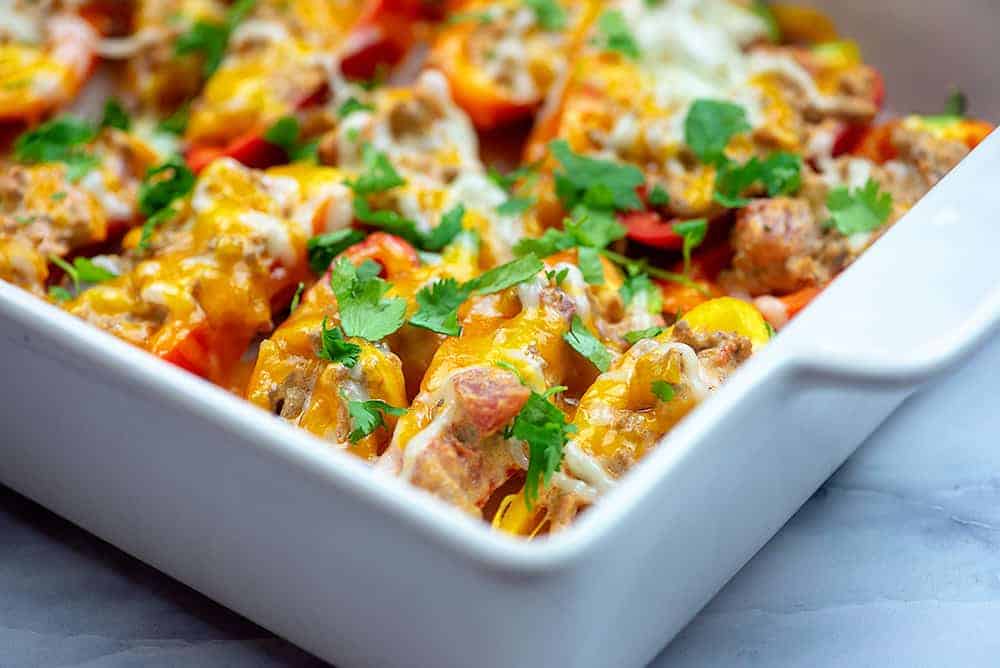 stuffed mini peppers in baking dish