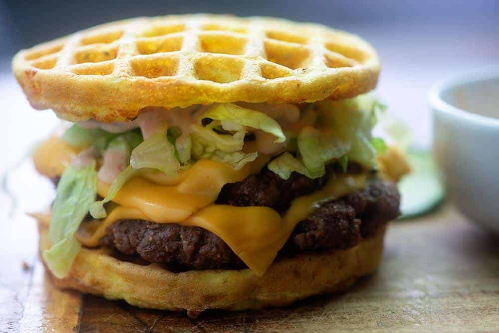 double cheeseburger with lettuce with chaffles as the bun