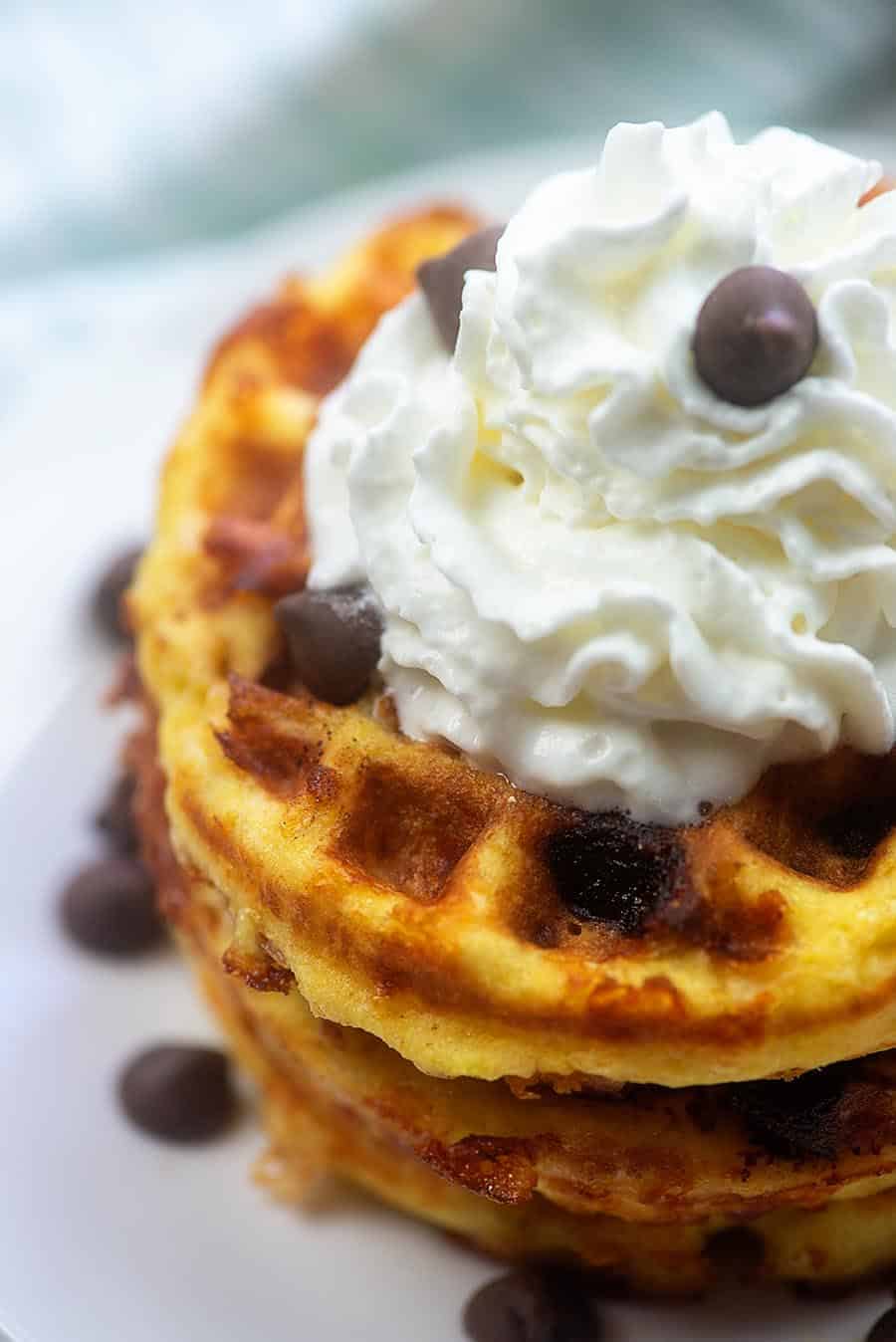 chocolate chips over whip cream  on top of  a few chaffles