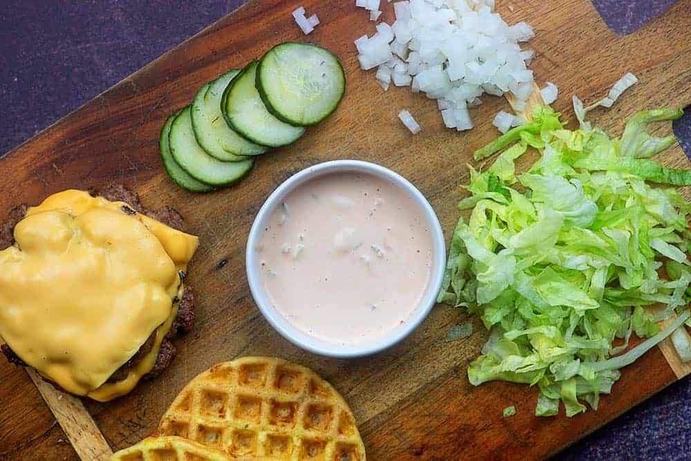 ingredients for cheeseburger chaffle on cutting board