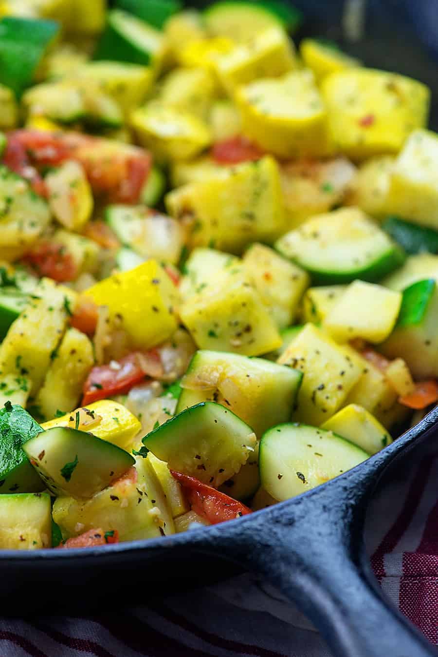 sauteed zucchini and squash in a cast iron skillet