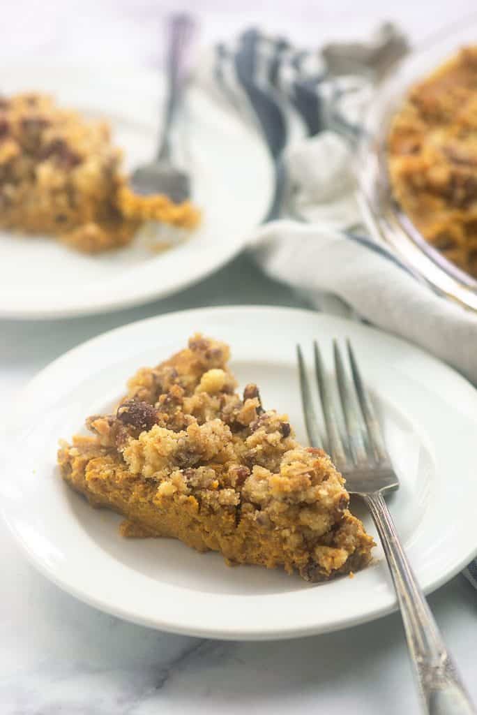 keto pumpkin pie on white plate.