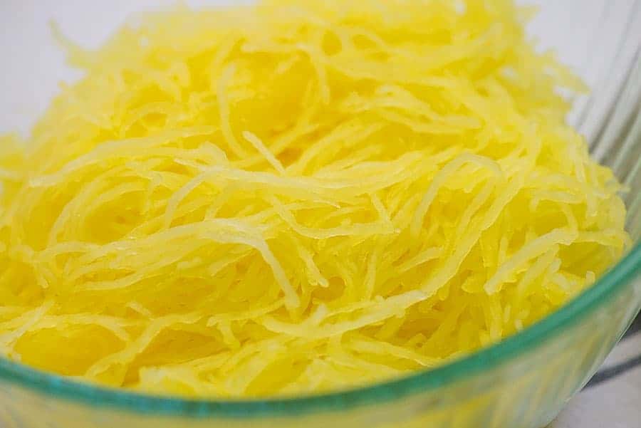 spaghetti squash strands in glass bowl.