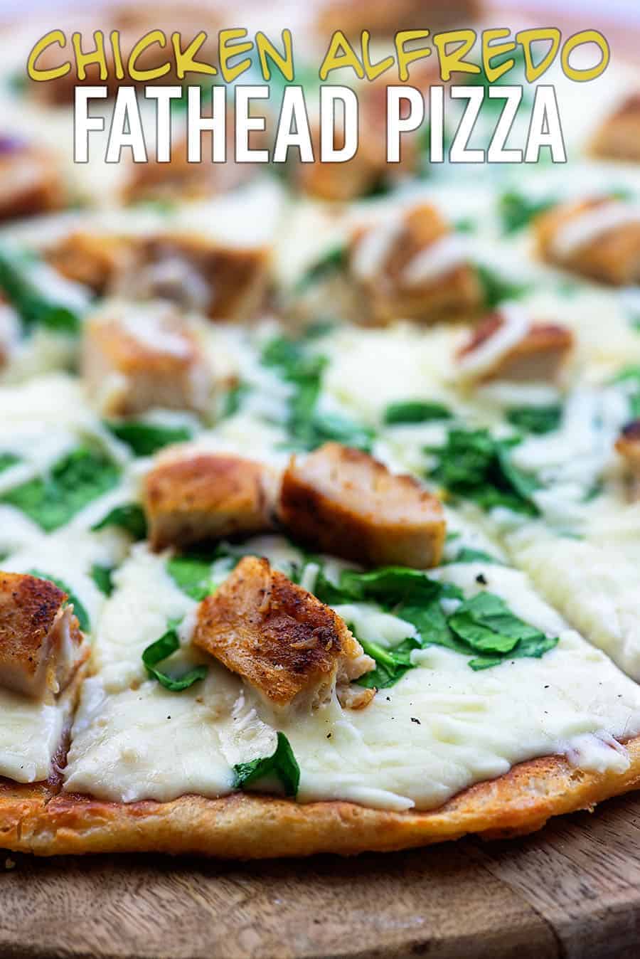 A close up of chicken alfredo pizza