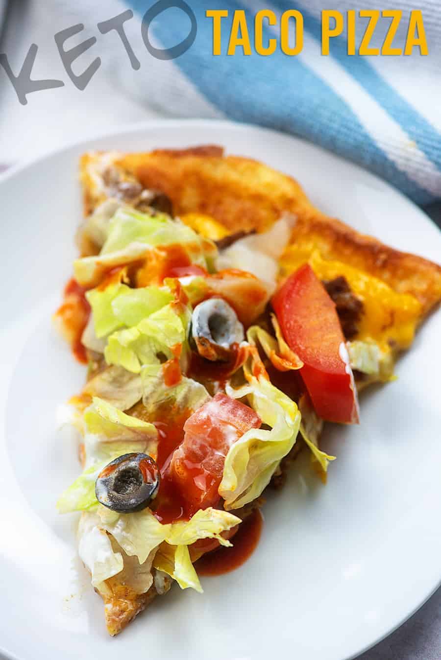 taco pizza slice on a white plate