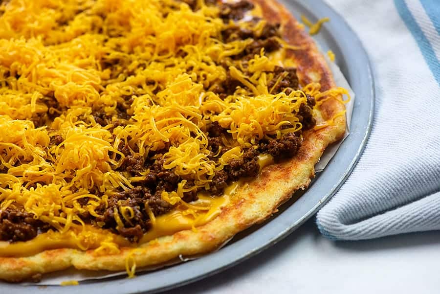 taco meat and cheese on a low carb pizza crust