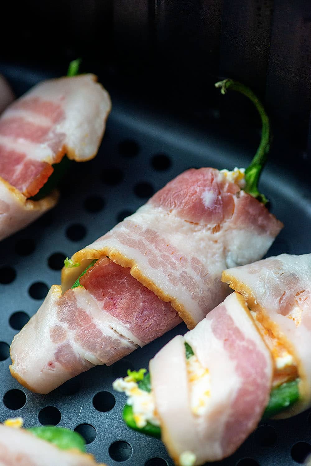 bacon wrapped jalapeno poppers in air fryer basket