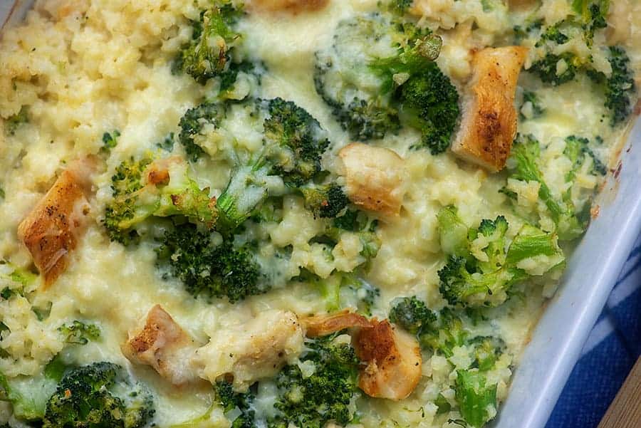 alfredo over broccoli in a baking pan
