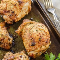 crispy baked chicken thighs on sheet pan.