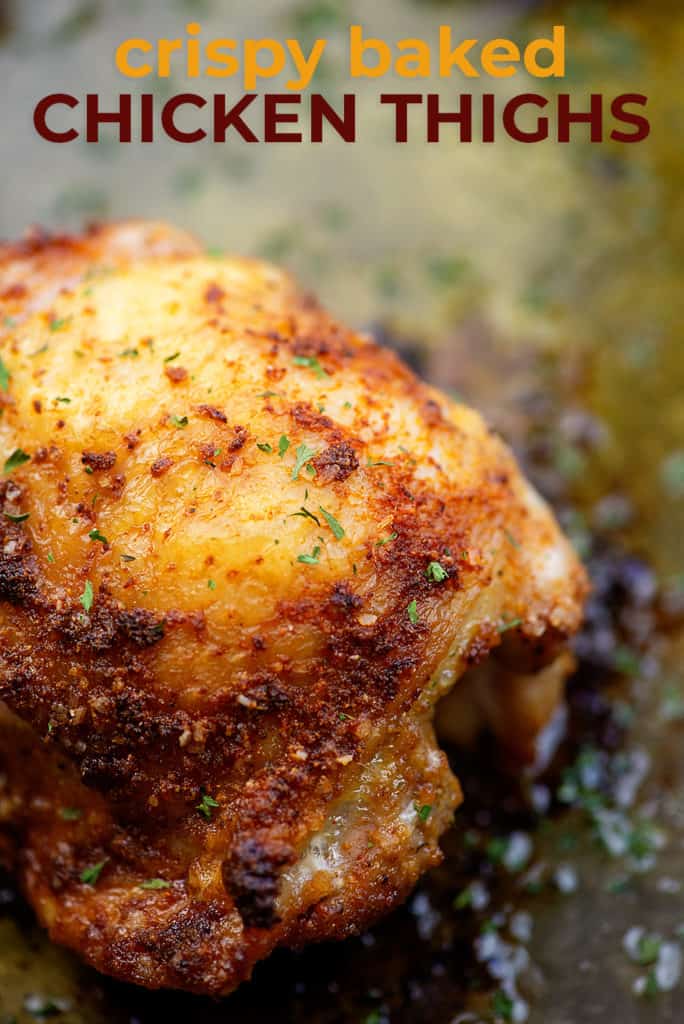 crispy baked chicken thighs on cookie sheet