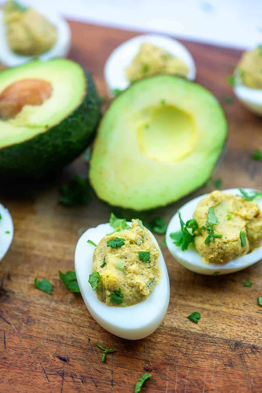 Deviled eggs without mayo on cutting board