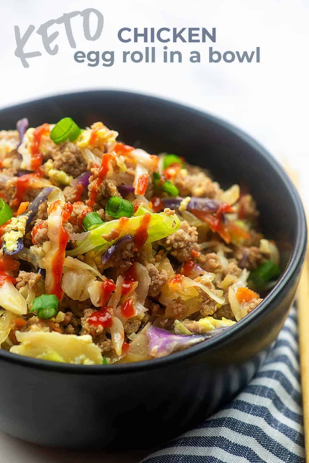 Egg roll filling in a black bowl.