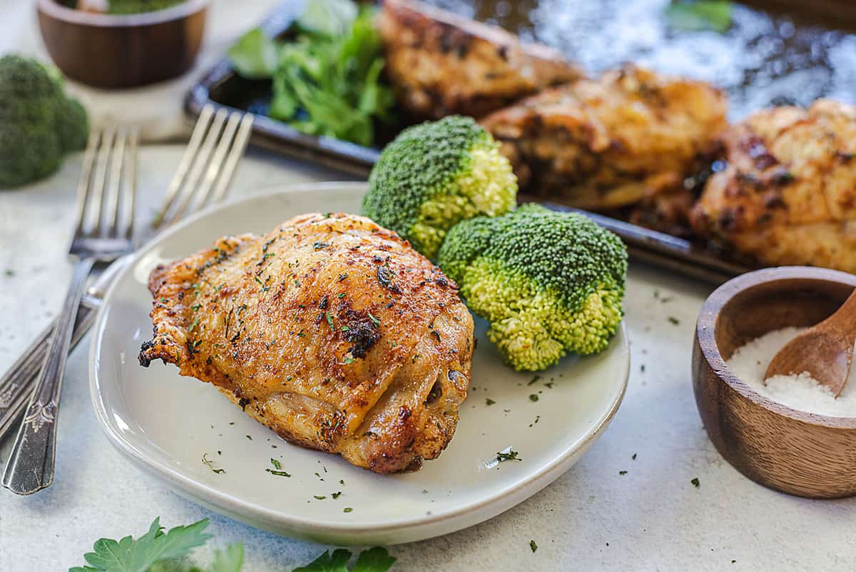 chicken and broccoli on small plate.