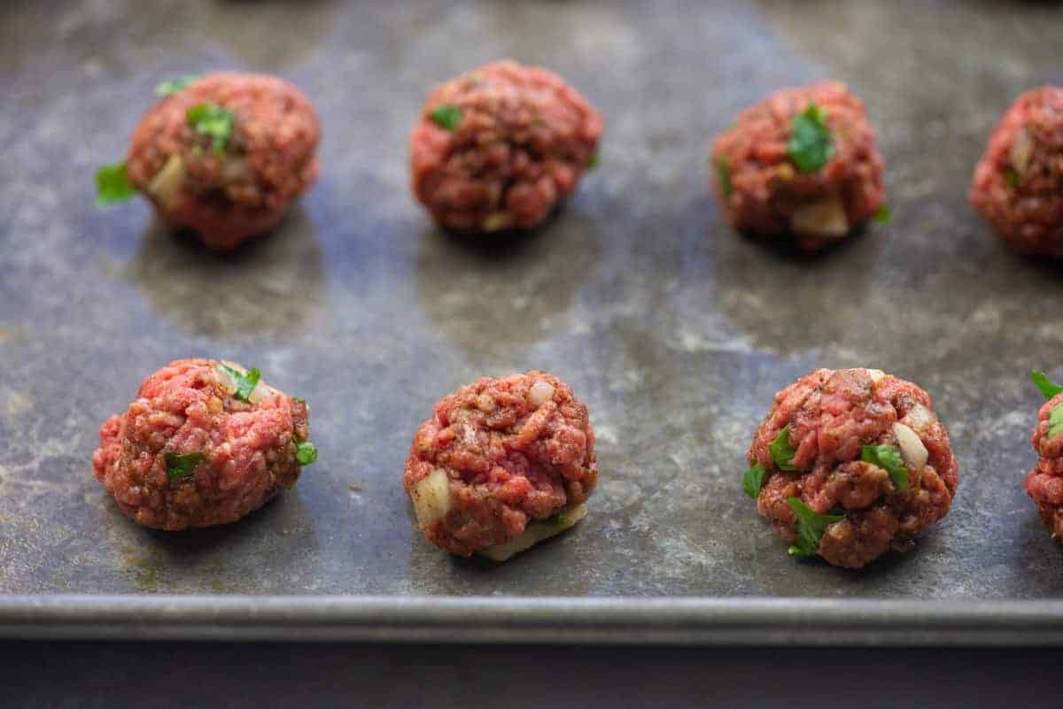 meatballs on cookie sheet