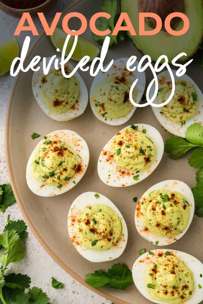 Avocado deviled eggs on a plate.