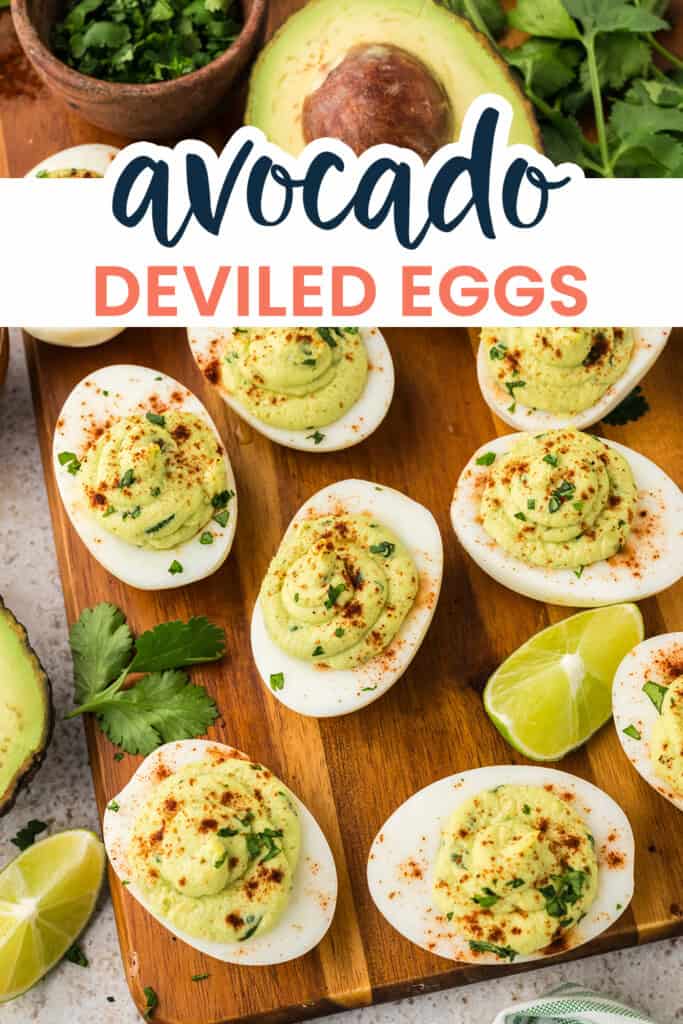 Avocado deviled eggs on board.