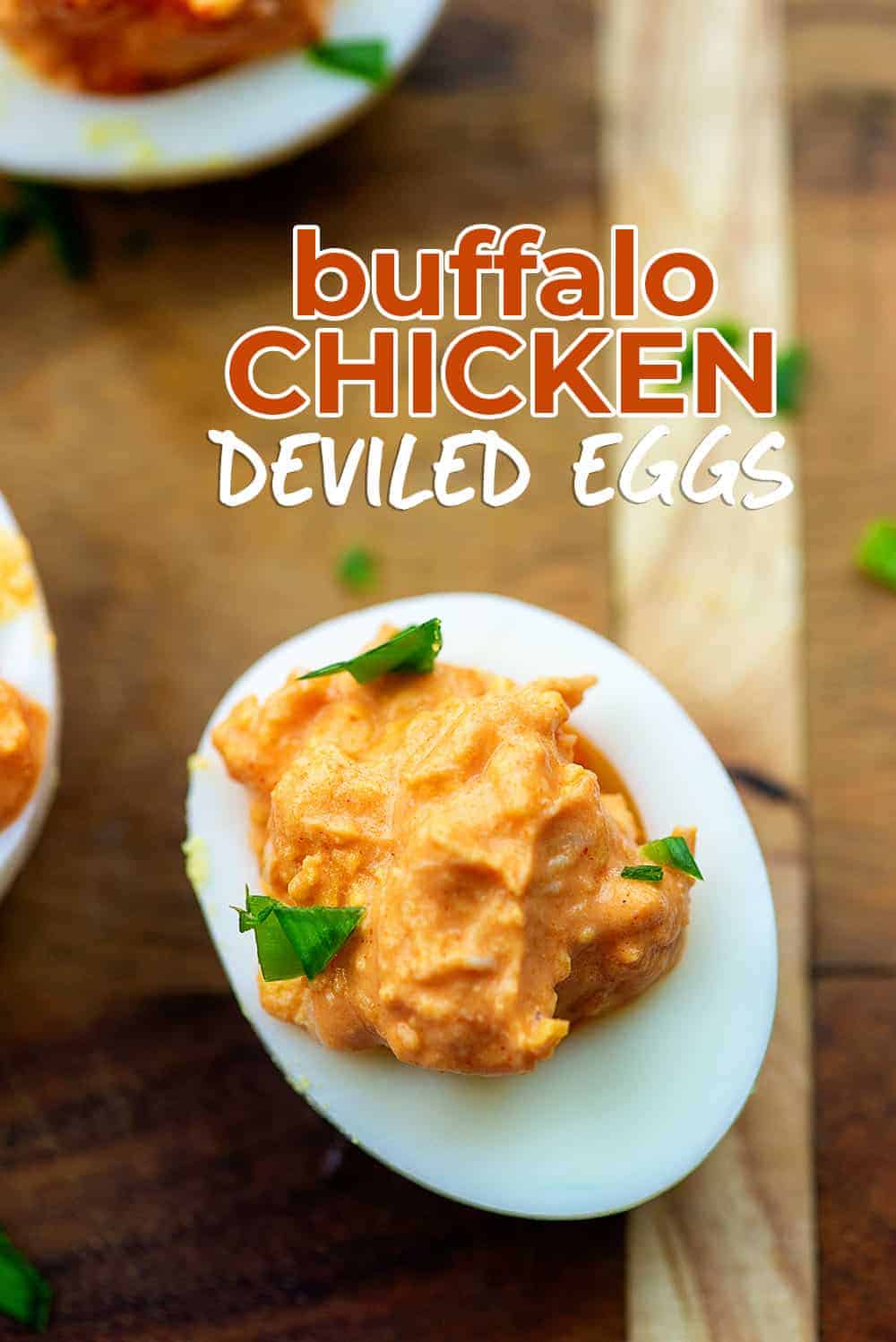 buffalo chicken deviled eggs on cutting board