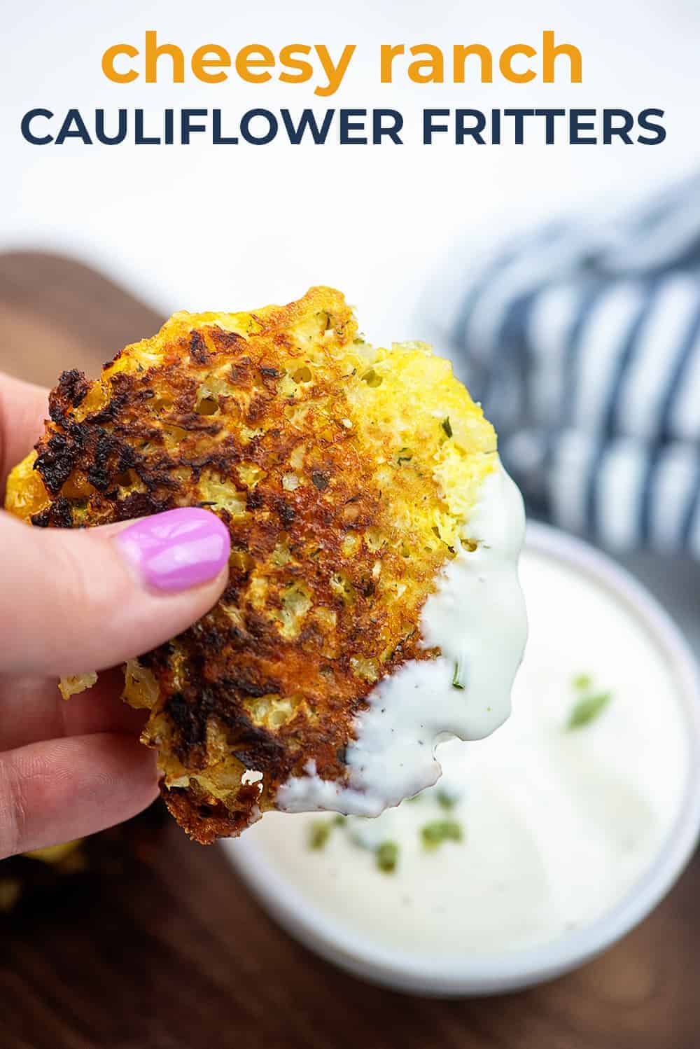 cauliflower fritter dipped in ranch dressing
