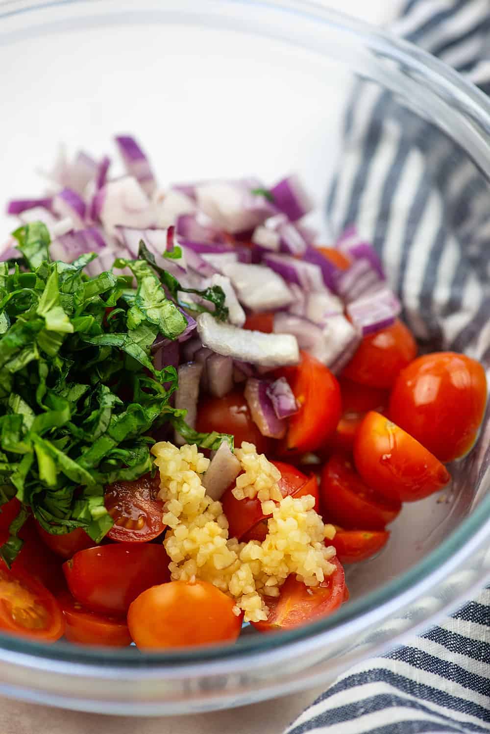 bruschetta ingredients in glass bowl