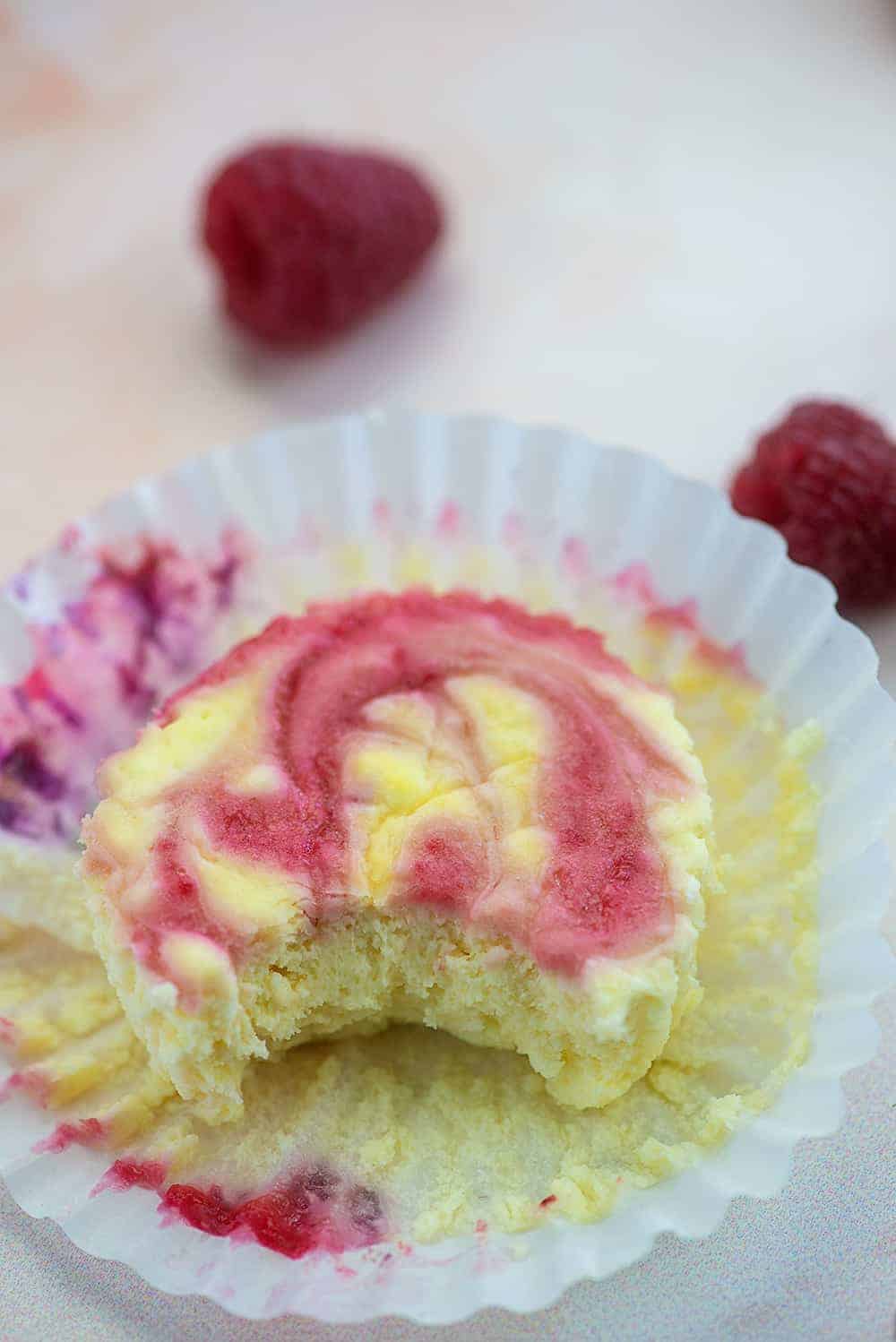 mini cheesecake recipe with raspberry swirl on paper liner