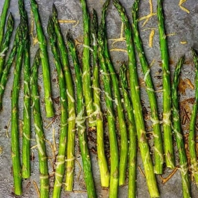 Roasted asparagus on sheet pan.