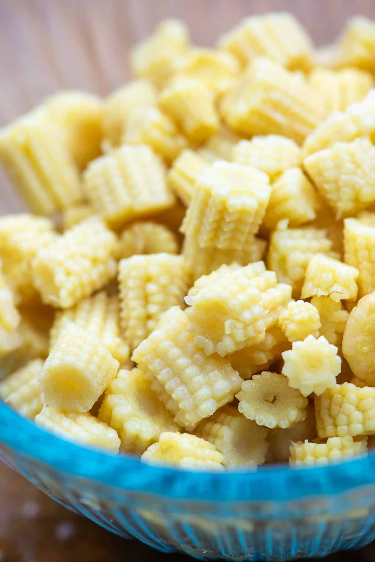 cut baby corn in glass bowl