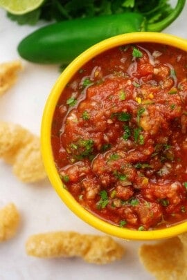 salsa recipe in yellow bowl with pork rinds
