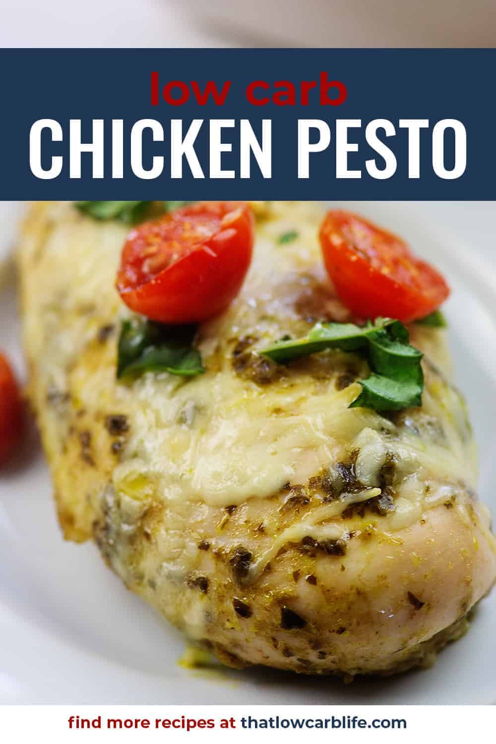 baked chicken pesto with tomatoes on white plate