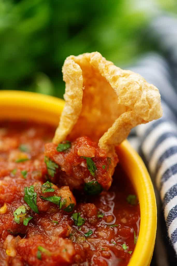 keto salsa recipe in yellow bowl with pork rind