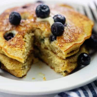stack of cut pancakes with blueberries on top