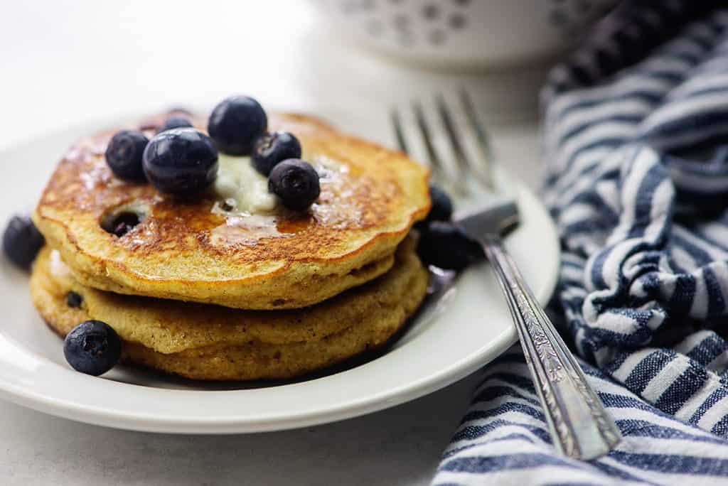 stack of keto pancakes on white plate