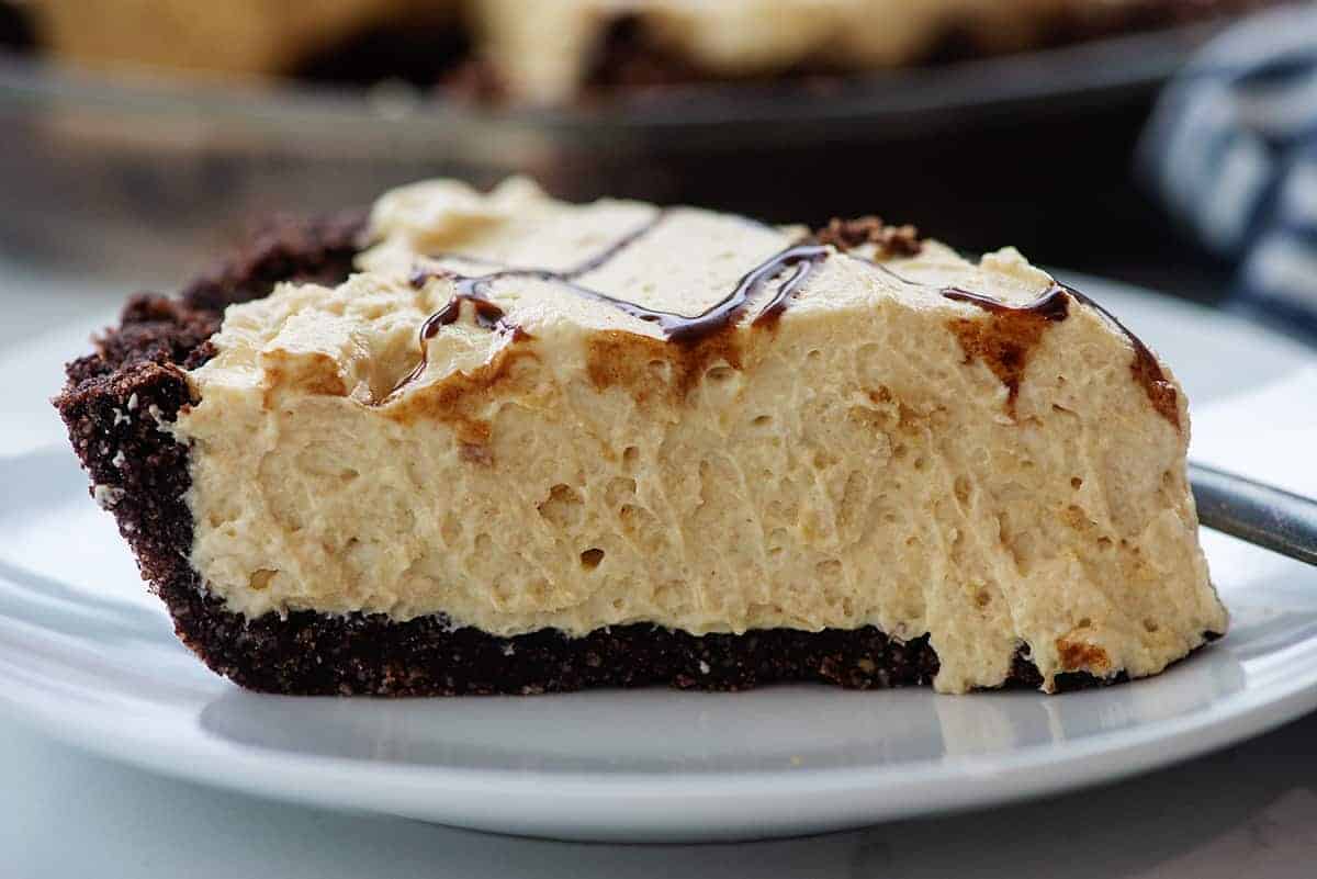 creamy peanut butter pie on white plate