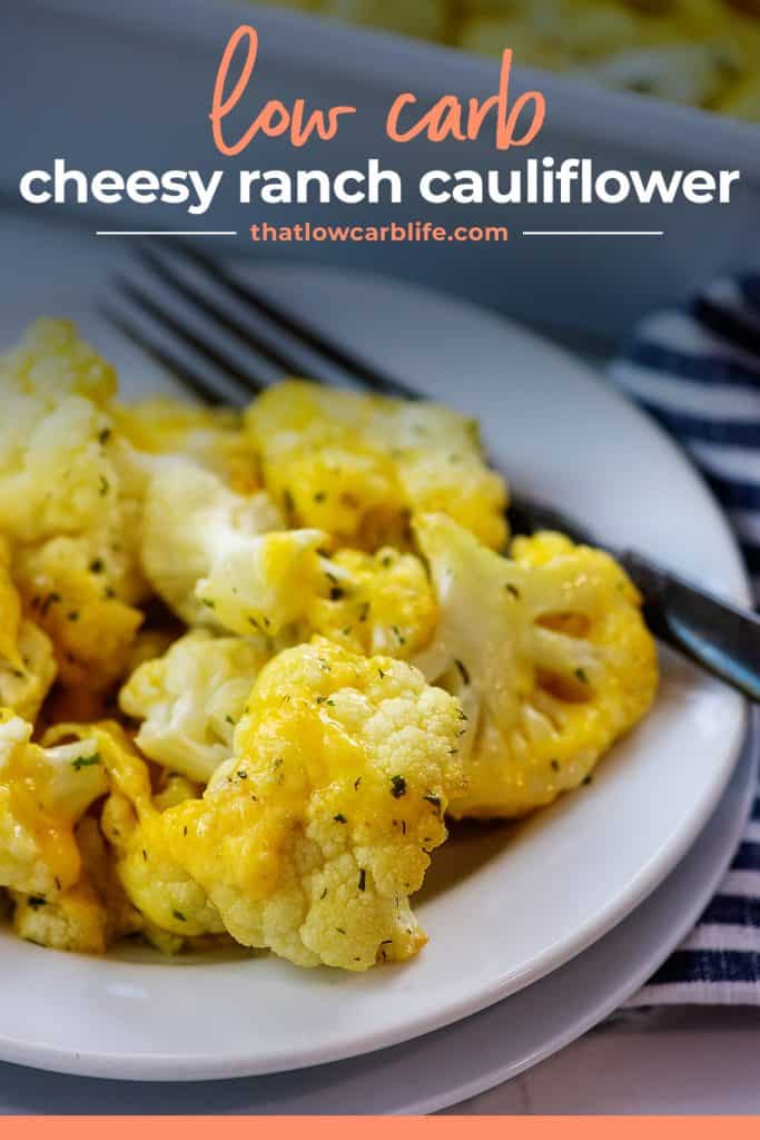 cheese covered cauliflower on white plate