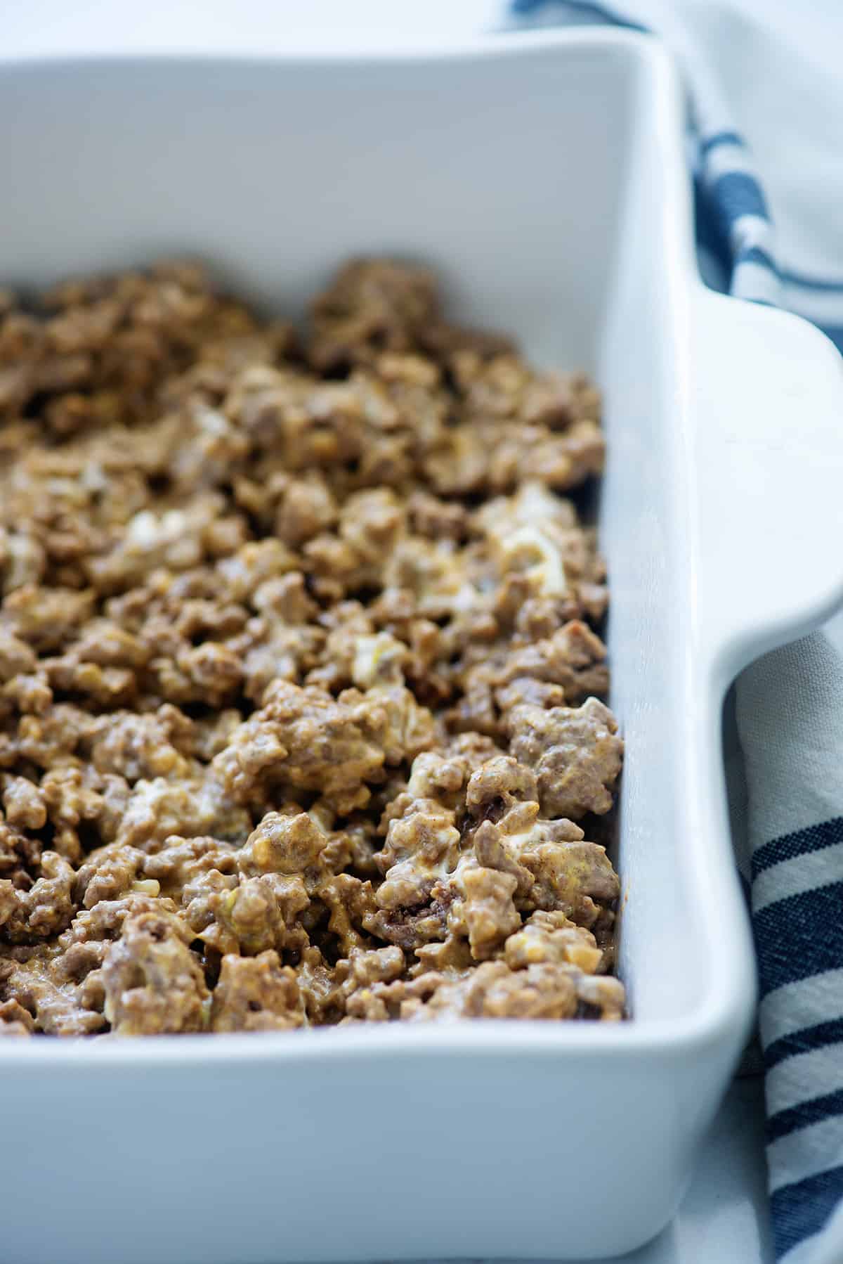 ground beef in white baking dish