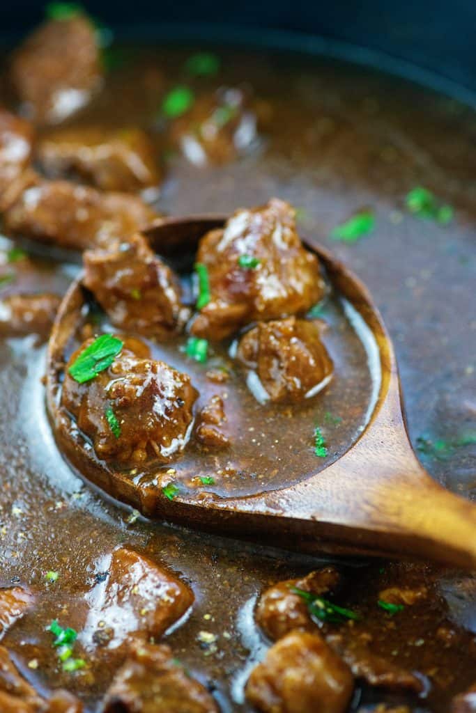 beef tips in a rich gravy with parsley on top