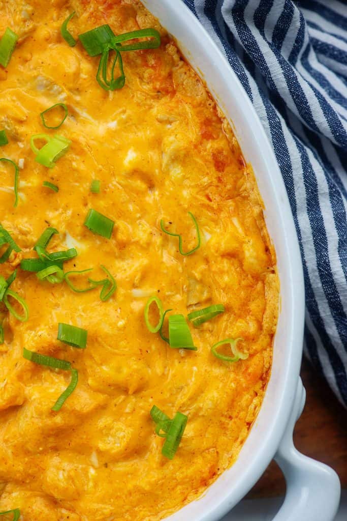 recipe for buffalo chicken dip in white baking dish