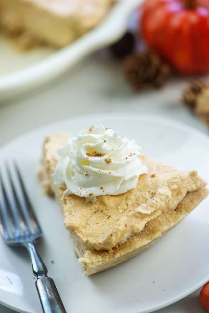 slice of low carb pumpkin pie on white plate