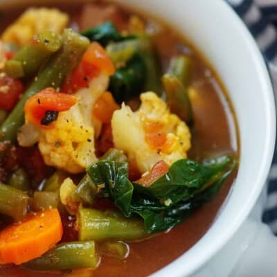 low carb vegetable soup in white bowl