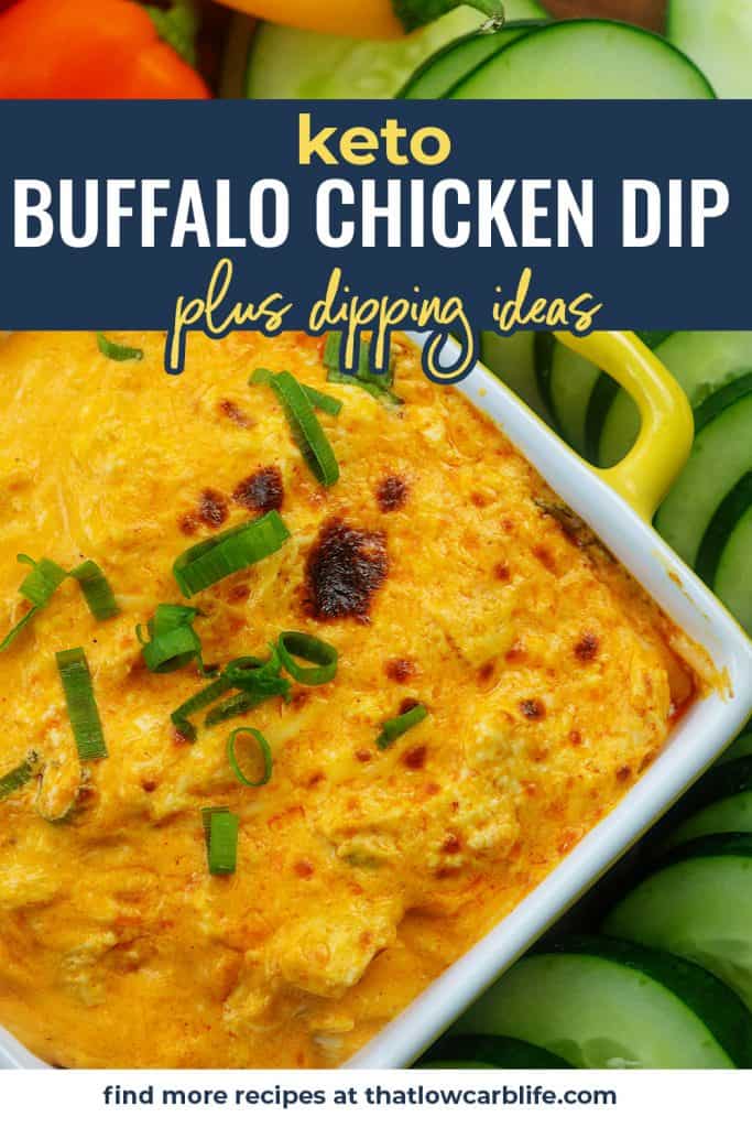 buffalo chicken dip in baking dish surrounded by fresh vegetables